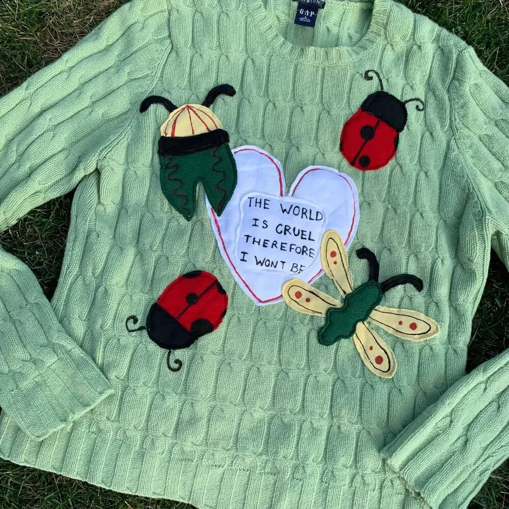 Custom Upcycled Green Wool Bug Patchwork Sweater “The World Is Cruel” M/L